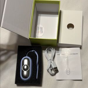 Silver and Blue Sleep Aid Device